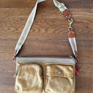 Coach gold cross body